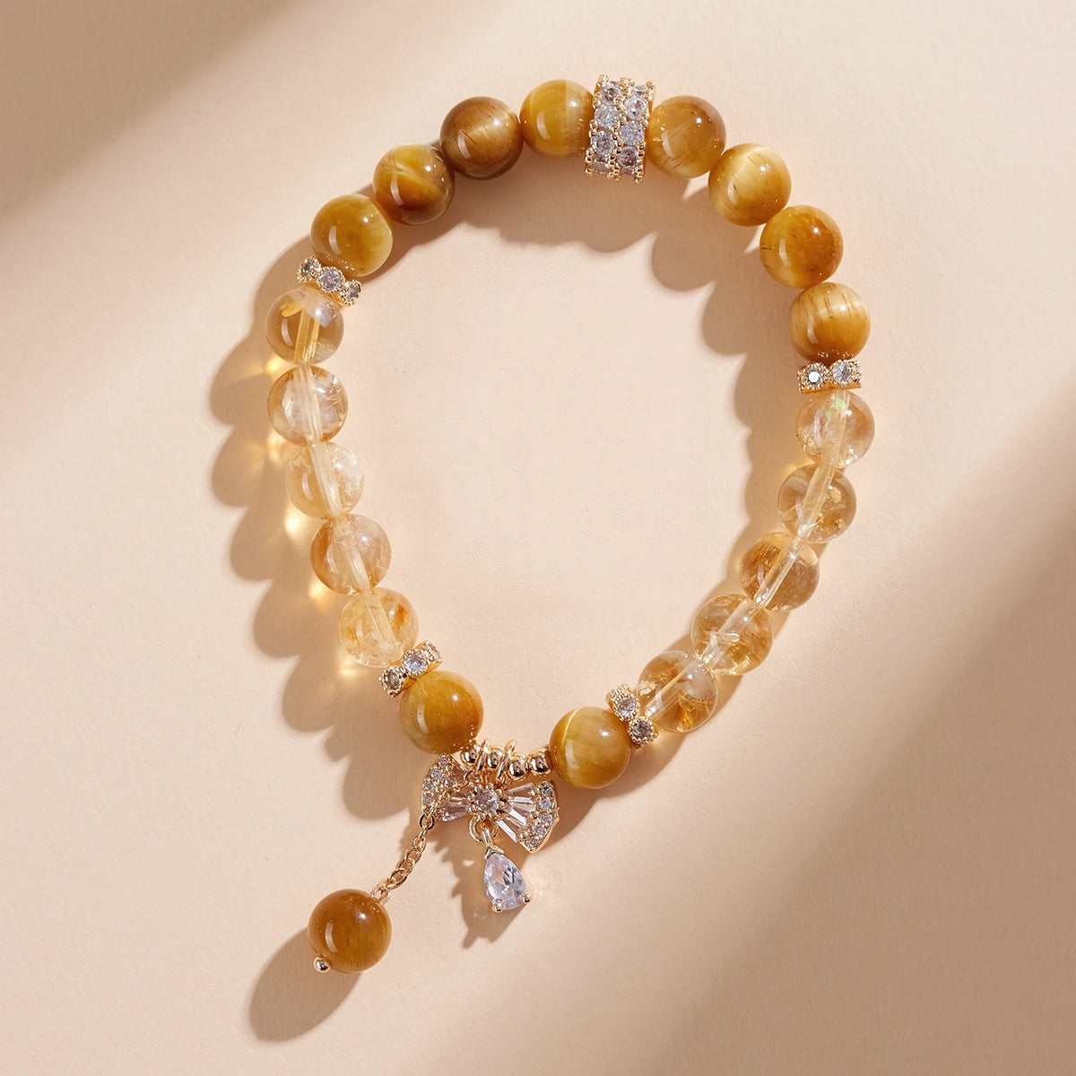 Golden Hour on Your Wrist — Tiger Eye & Citrine Bow Charm Bracelet